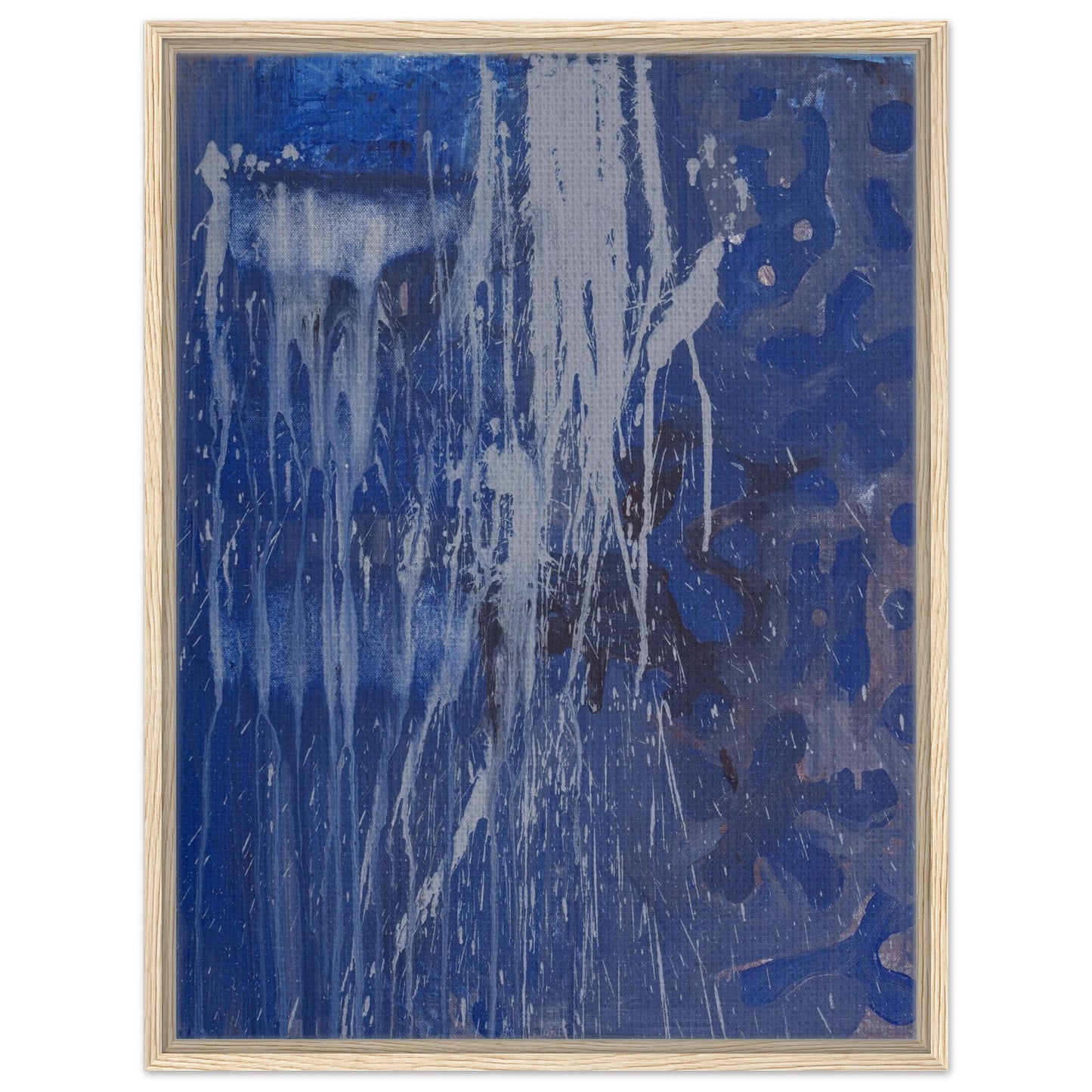 Der Leinwanddruck "Blue Abstract" in einem Holzrahmen.