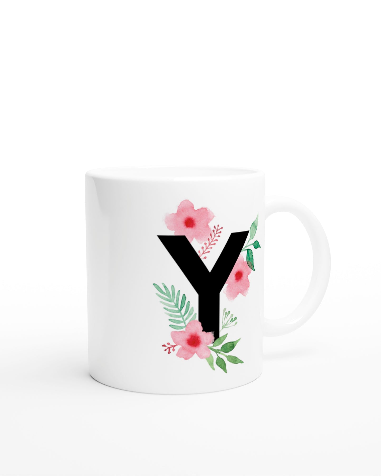 Weiße Keramiktasse mit schwarzem Buchstaben Y und rosa-grünen Aquarell-Blumen
