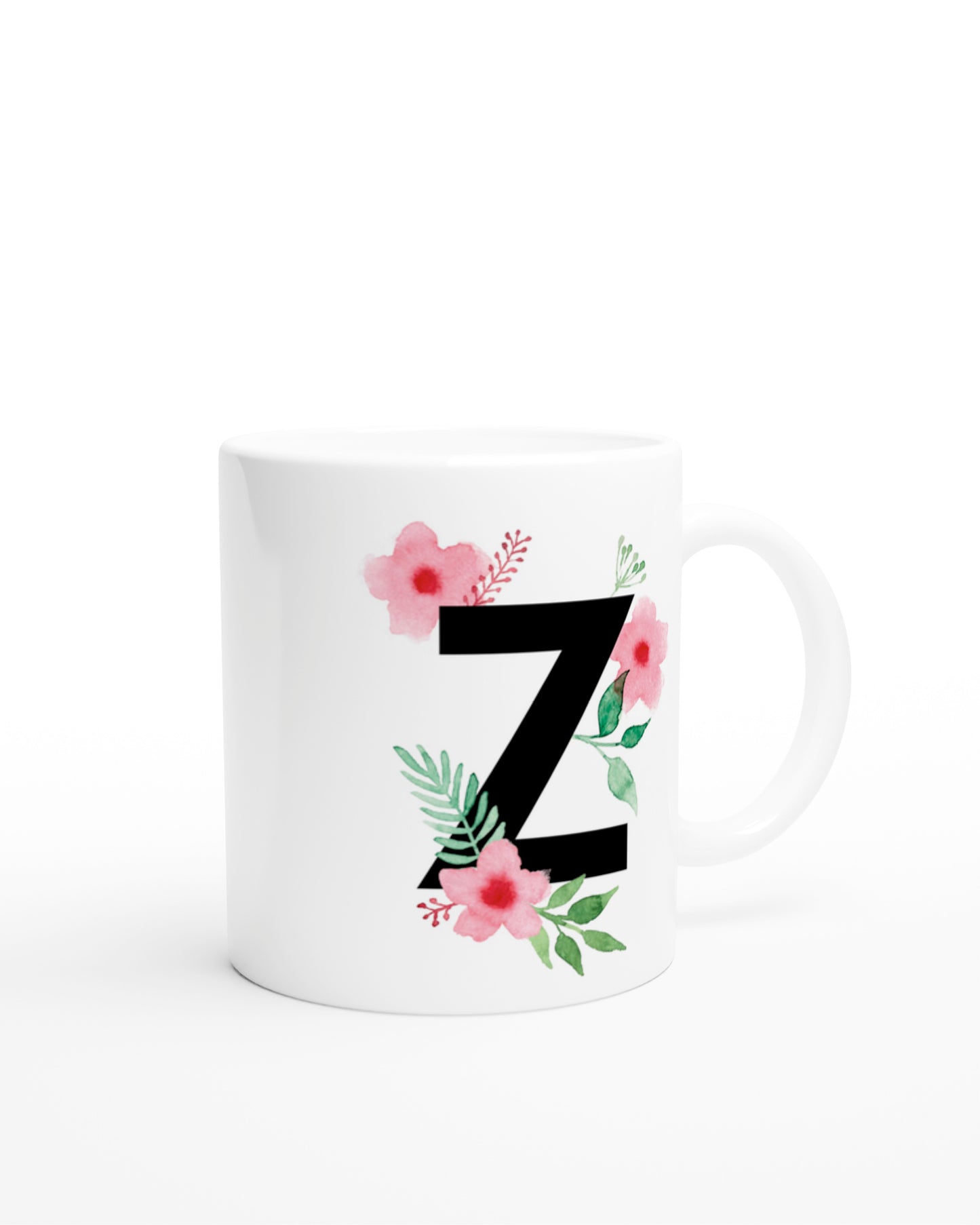 Weiße Keramiktasse mit schwarzem Buchstaben Z und rosa-grünen Aquarell-Blumen