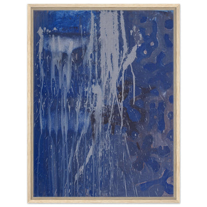Der Leinwanddruck "Blue Abstract" in einem Holzrahmen.