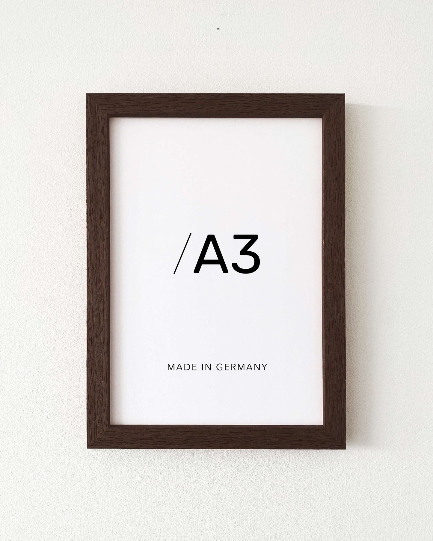 Holzrahmen für Poster in Wenge lasiert, matt mit fühl- und sichtbarer Holzstruktur in A3.